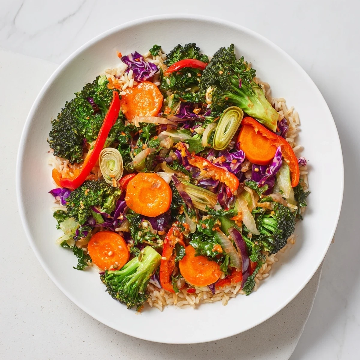 Steaming bowl of Quick Winter Vegetable Stir-Fry with Rice, showcasing colorful, perfectly cooked winter vegetables.