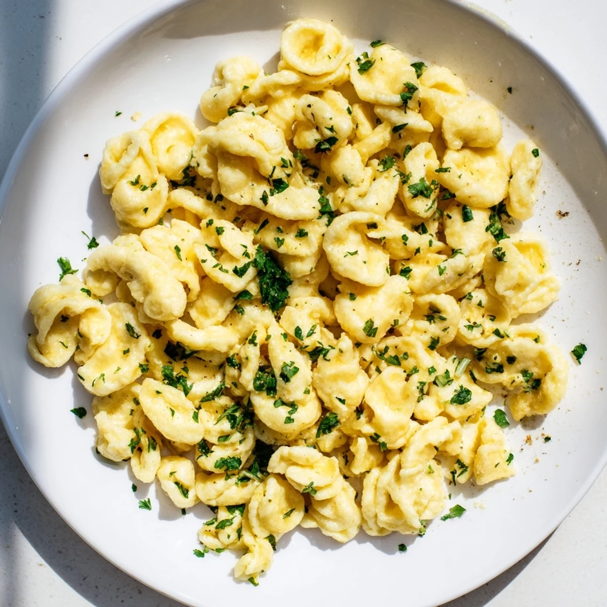 Delicious, homemade spaetzle: fluffy egg noodles ready to be tossed in savory gravy.