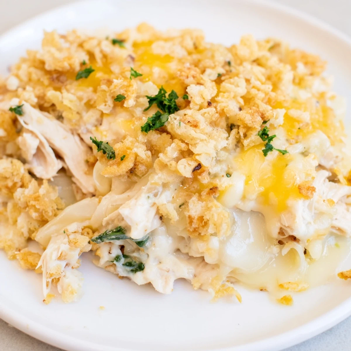 This creamy, cheesy Marry Me Chicken Casserole showcases tender chicken and sun-dried tomatoes.