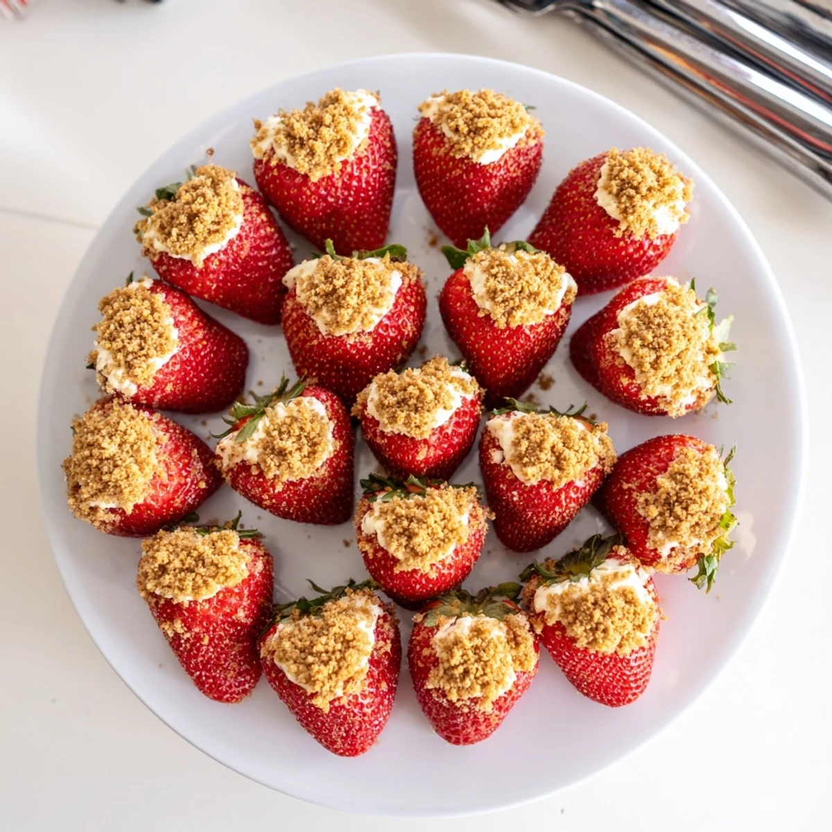 Fresh Cheesecake Stuffed Strawberries, bite-sized and overflowing with creamy cheesecake filling, ready to serve.