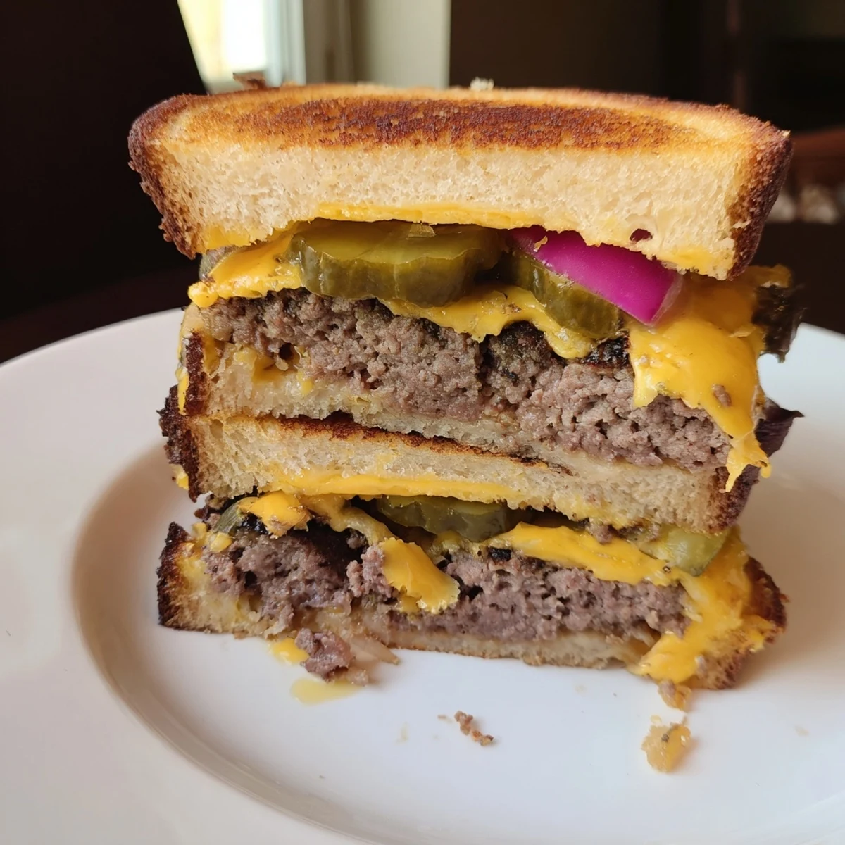 Perfectly grilled and stacked high, this Smashed Burger Grilled Cheese looks incredibly satisfying.