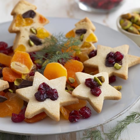 Festive Christmas Joy Trios arranged on a platter ready to be shared at your holiday gathering.